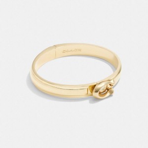 COACH® Sculpted Signature Hinged Bangle Women Jewelry Gold | LUCX03986