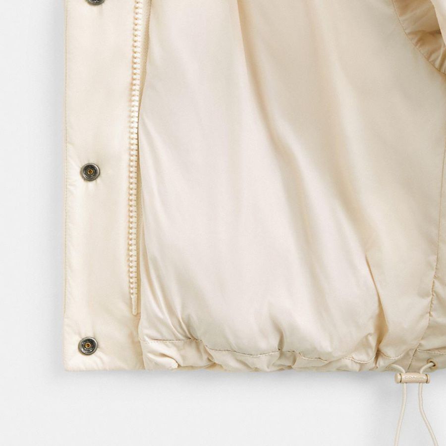 COACH® Cropped Puffer In Recycled Polyamide With Sherpa Collar Women Jacket White | TOBE95287