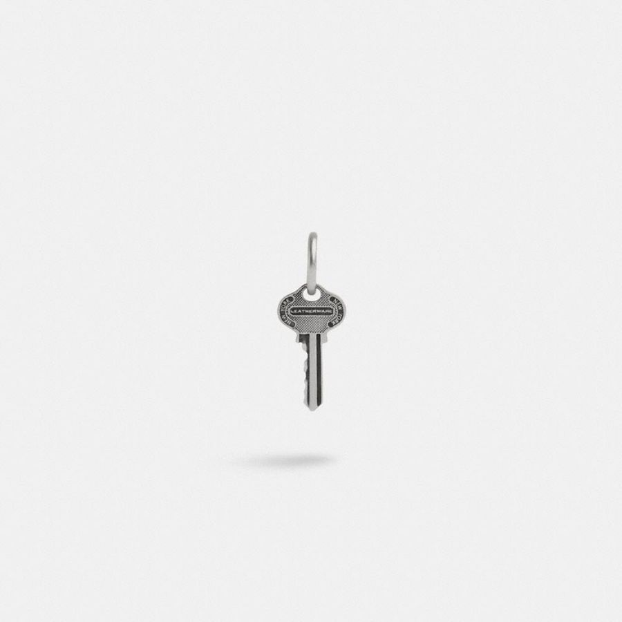 COACH® Sterling Key Single Huggie Earring Men Jewelry Silver | QTXH25640