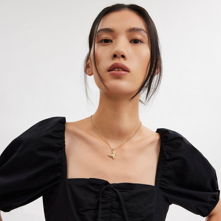 COACH® Stitched Rexy Pendant Necklace Women Jewelry Gold | PRED68452