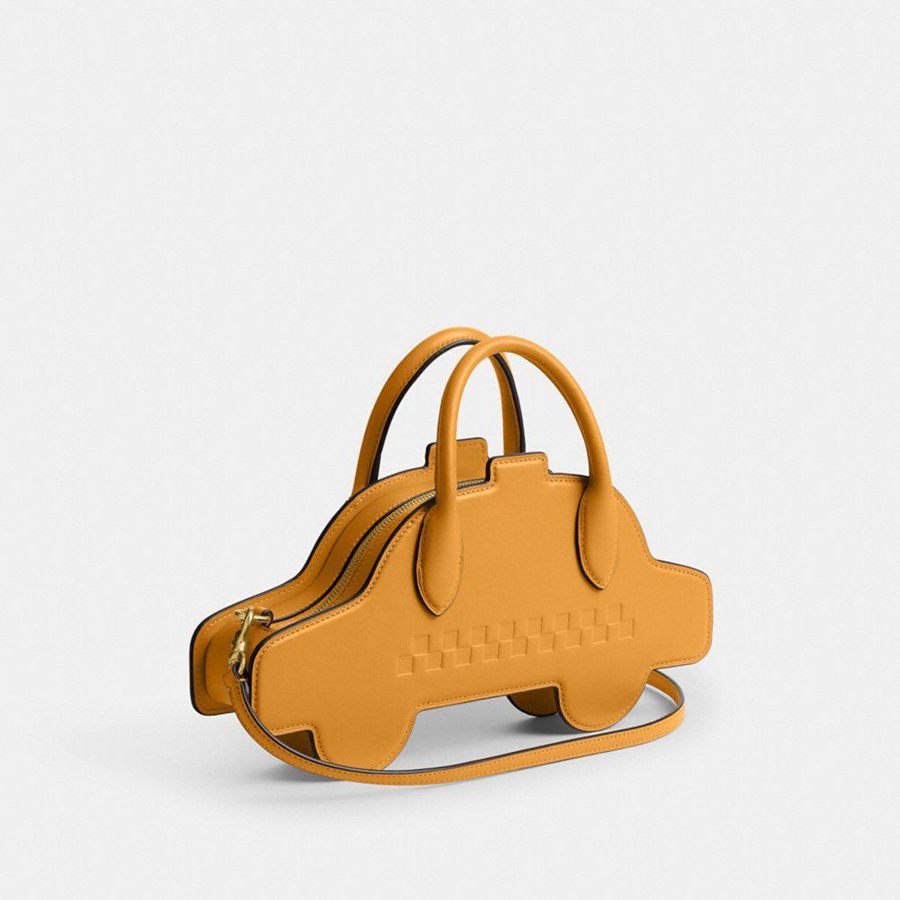 COACH® Taxi Women Crossbody Bag Yellow | WYEO17603