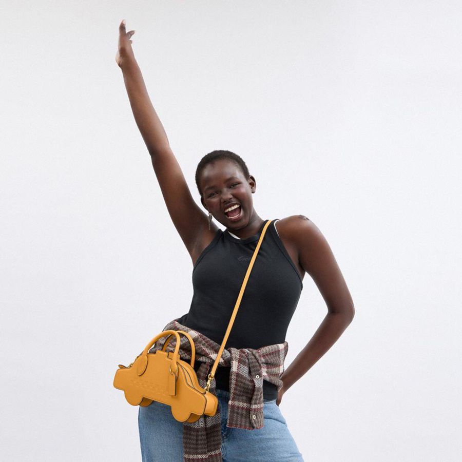 COACH® Taxi Women Crossbody Bag Yellow | WYEO17603