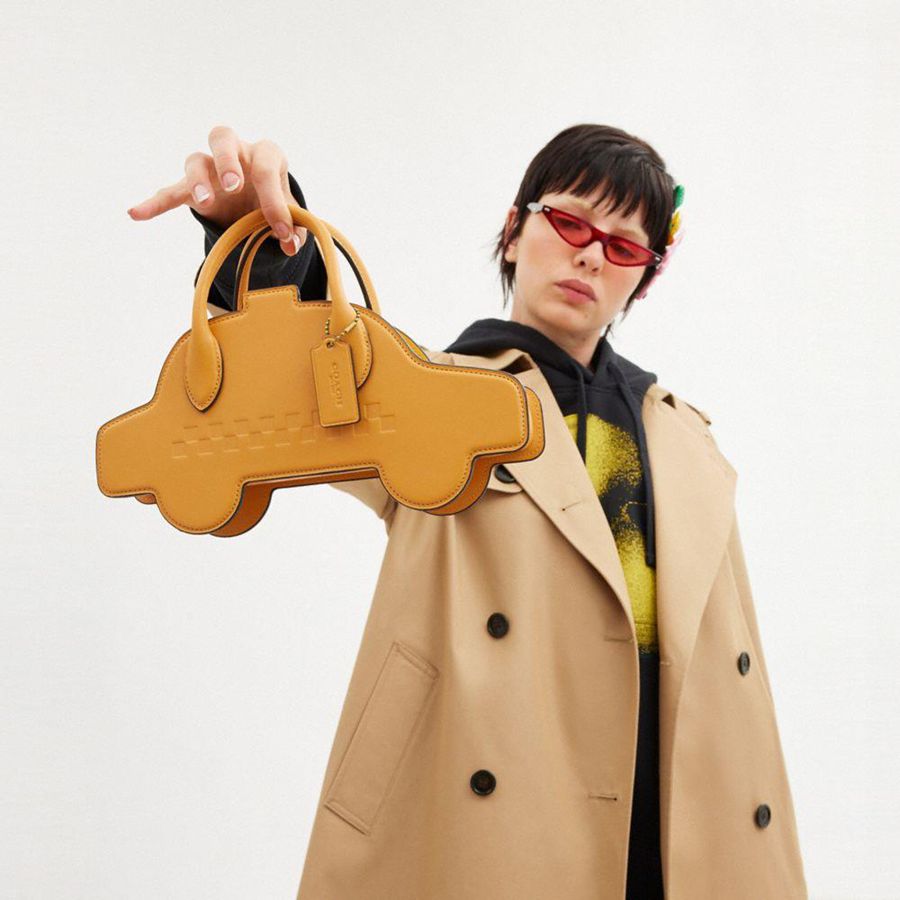 COACH® Taxi Women Crossbody Bag Yellow | WYEO17603